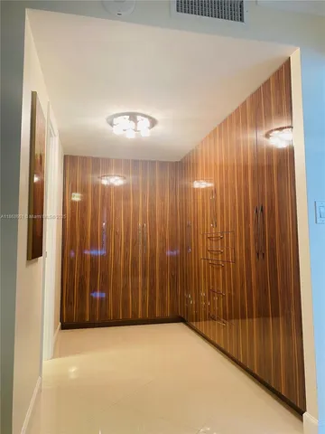 an empty room with a elevator