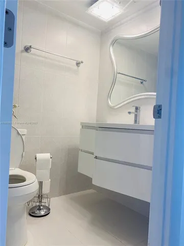 a bathroom with a sink and a toilet