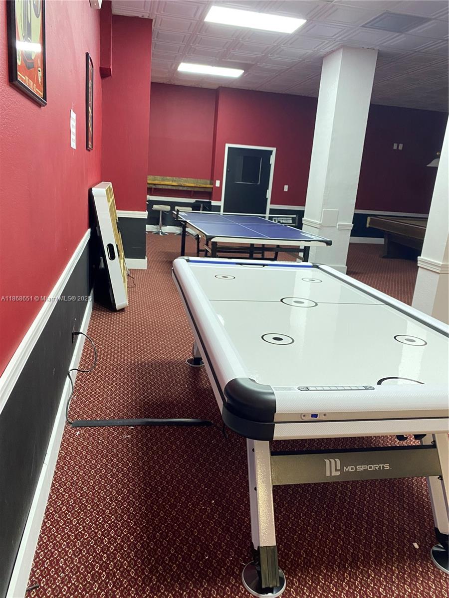 230 174th Street, Unit 507 Sunny Isles Beach, FL 33160 - Photo 26 of 28 a view of kitchen with furniture