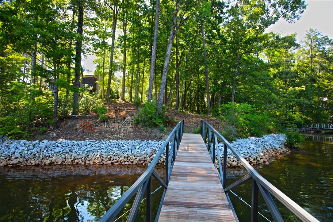 1359 Hbr Rdg Road Seneca, SC 29672 - Photo 27 of 39 Walk directly from the water's edge to a secluded wooded retreat via a private dock.