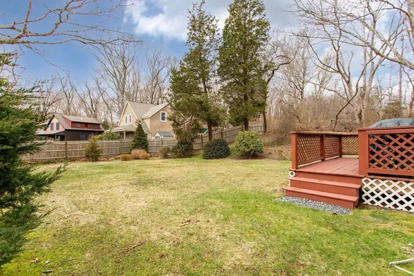 a view of outdoor space with garden and trees