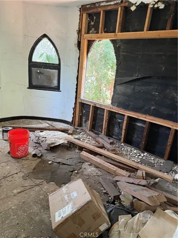 a kitchen with sink refrigerator and stove