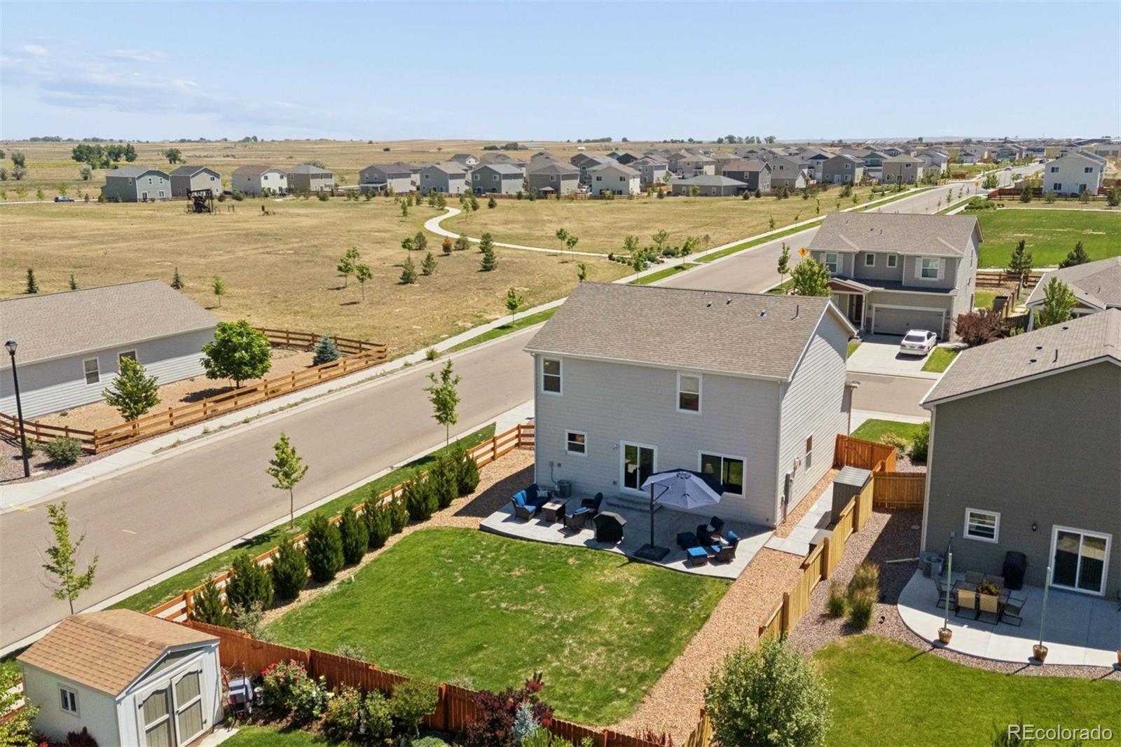 7307 Animas Avenue Frederick, CO 80530 - Photo 39 of 49 an aerial view of a house with outdoor space swimming pool and ocean view