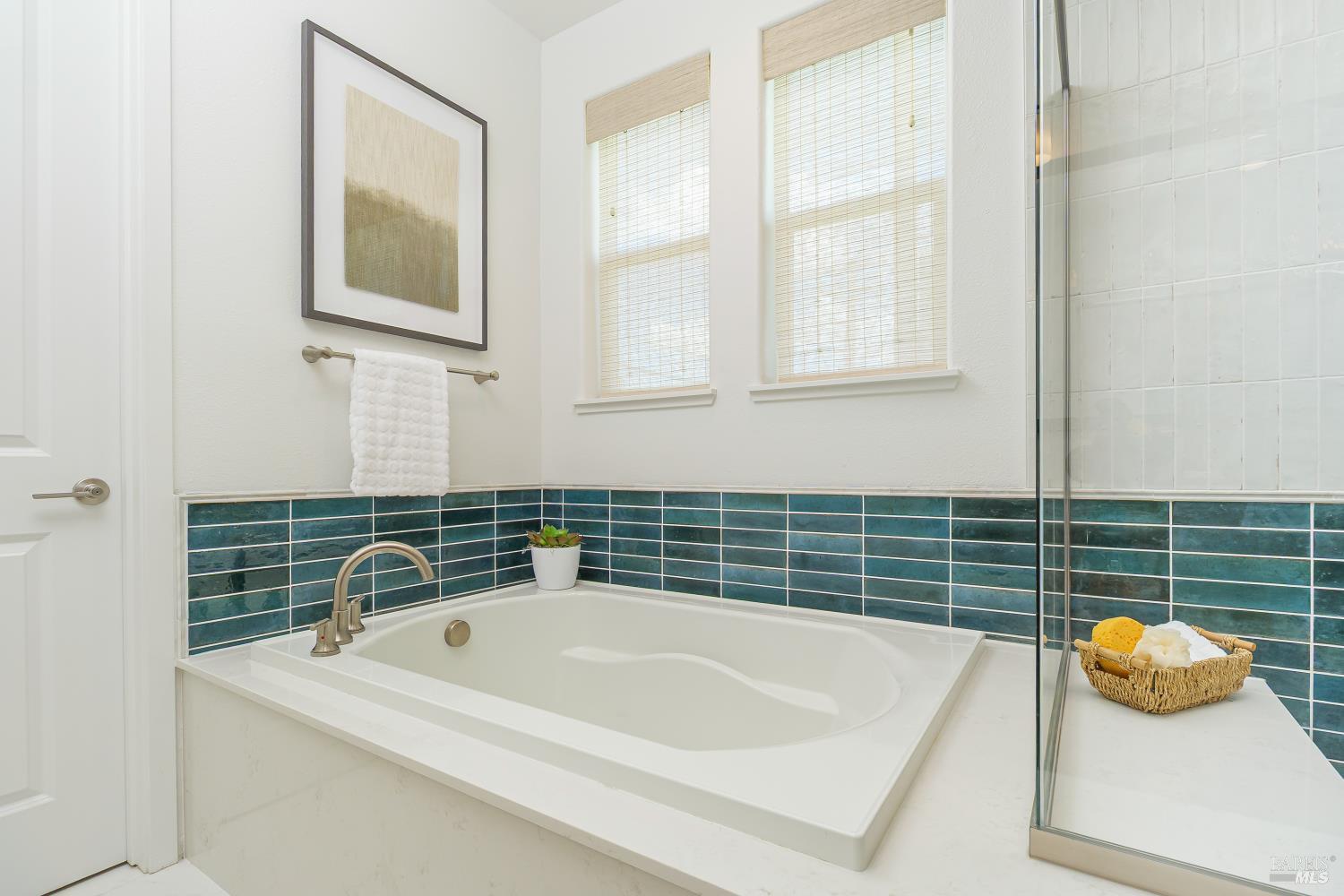 1201 Del Rancho Way Petaluma, CA 94954 - Photo 20 of 56 a bath tub sitting next to a window