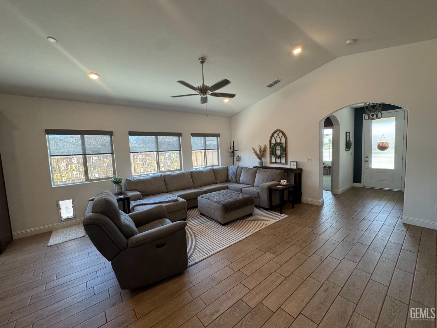 Undisclosed Address Shafter, CA 93263 - Photo 11 of 46 a living room with furniture and a wooden floor