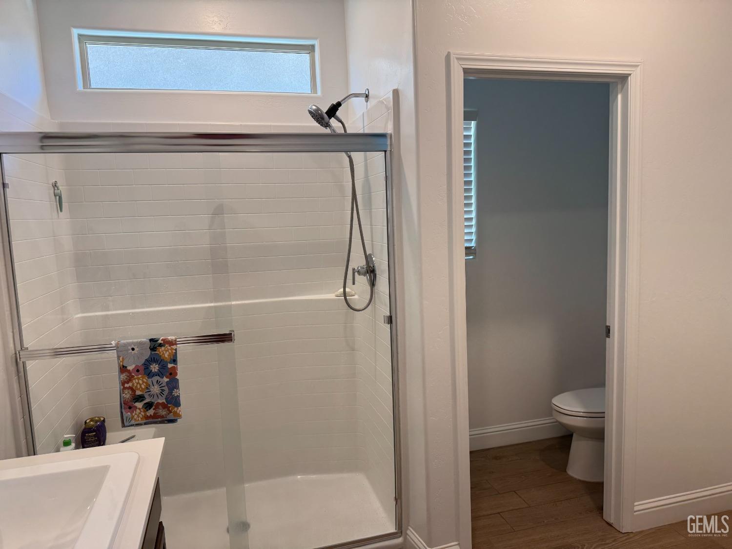 Undisclosed Address Shafter, CA 93263 - Photo 24 of 46 a bathroom with a shower and a toilet