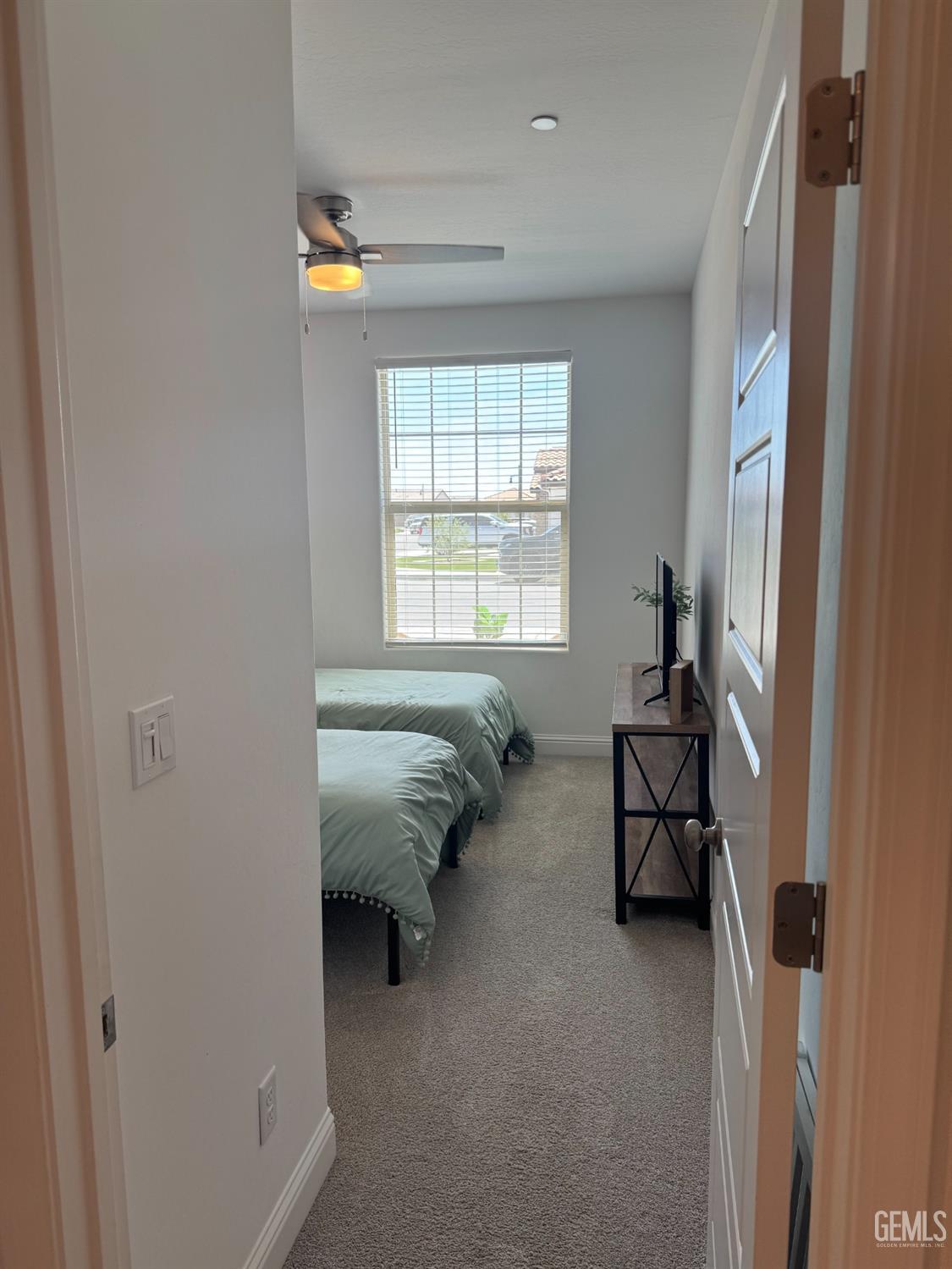 Undisclosed Address Shafter, CA 93263 - Photo 27 of 46 a living room with furniture and a window