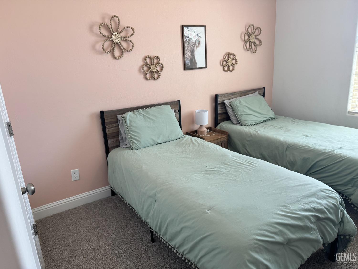 Undisclosed Address Shafter, CA 93263 - Photo 28 of 46 a large bed sitting in a bedroom next to a wall