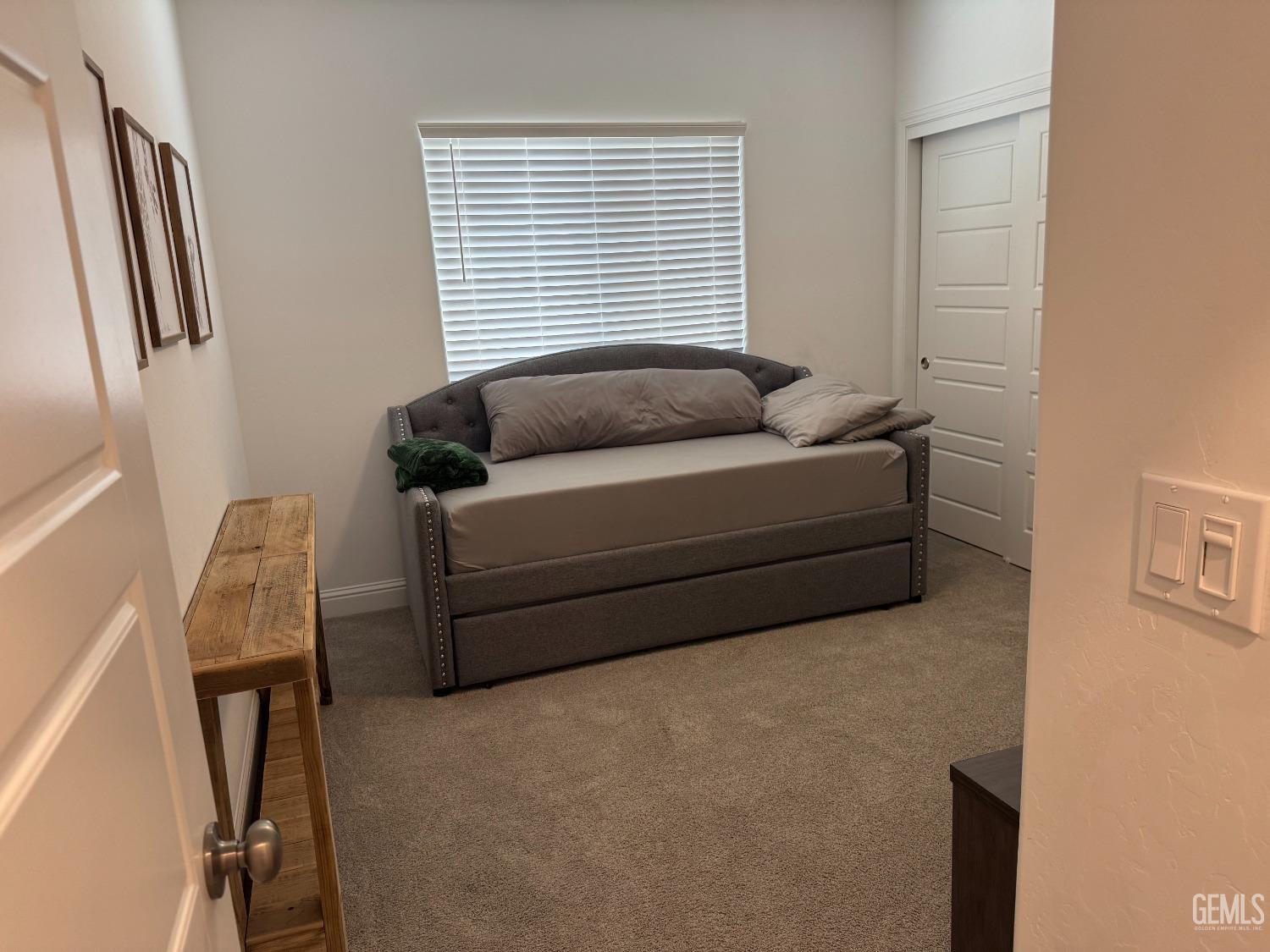 Undisclosed Address Shafter, CA 93263 - Photo 33 of 46 a living room with furniture and a window