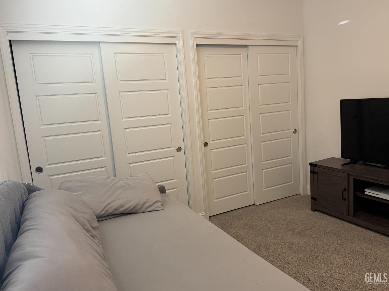 Undisclosed Address Shafter, CA 93263 - Photo 34 of 46 a bedroom with a bed and furniture