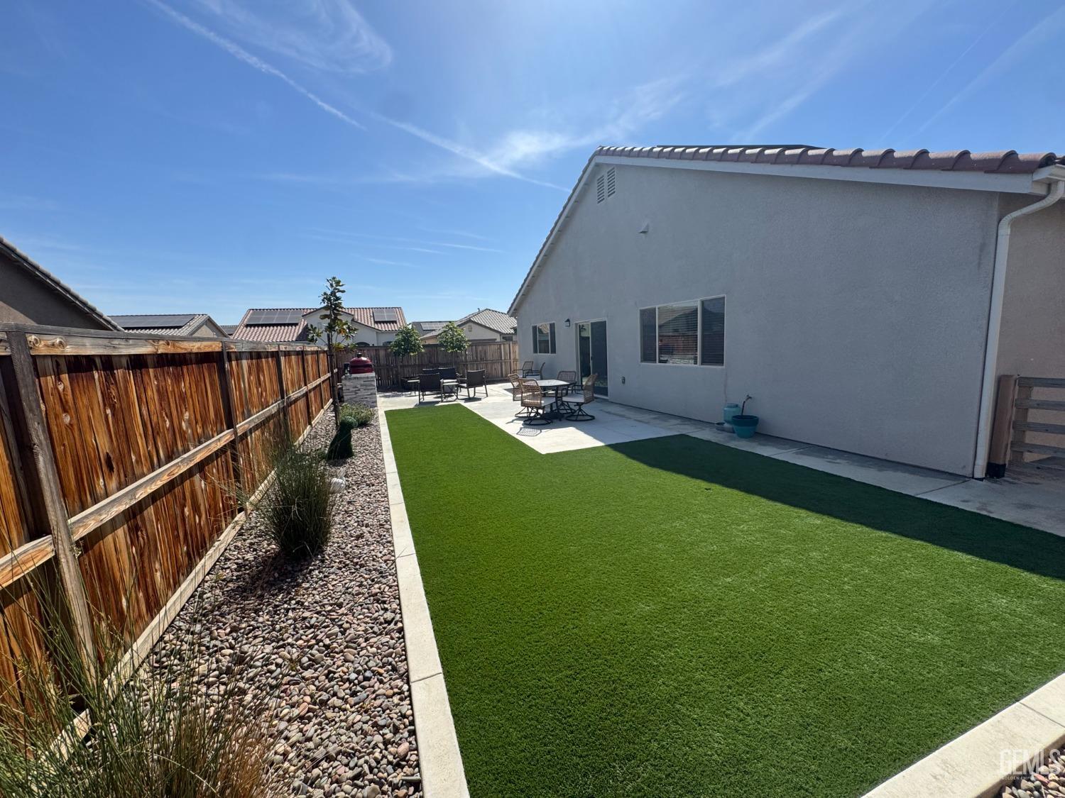 Undisclosed Address Shafter, CA 93263 - Photo 35 of 46 a house view with a garden space