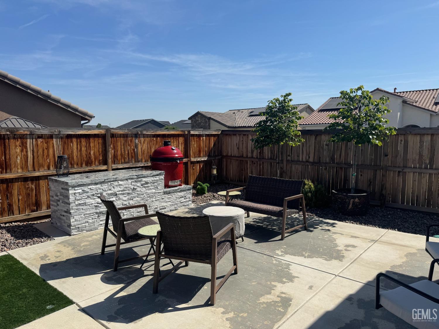 Undisclosed Address Shafter, CA 93263 - Photo 38 of 46 a view of a patio filled with furniture