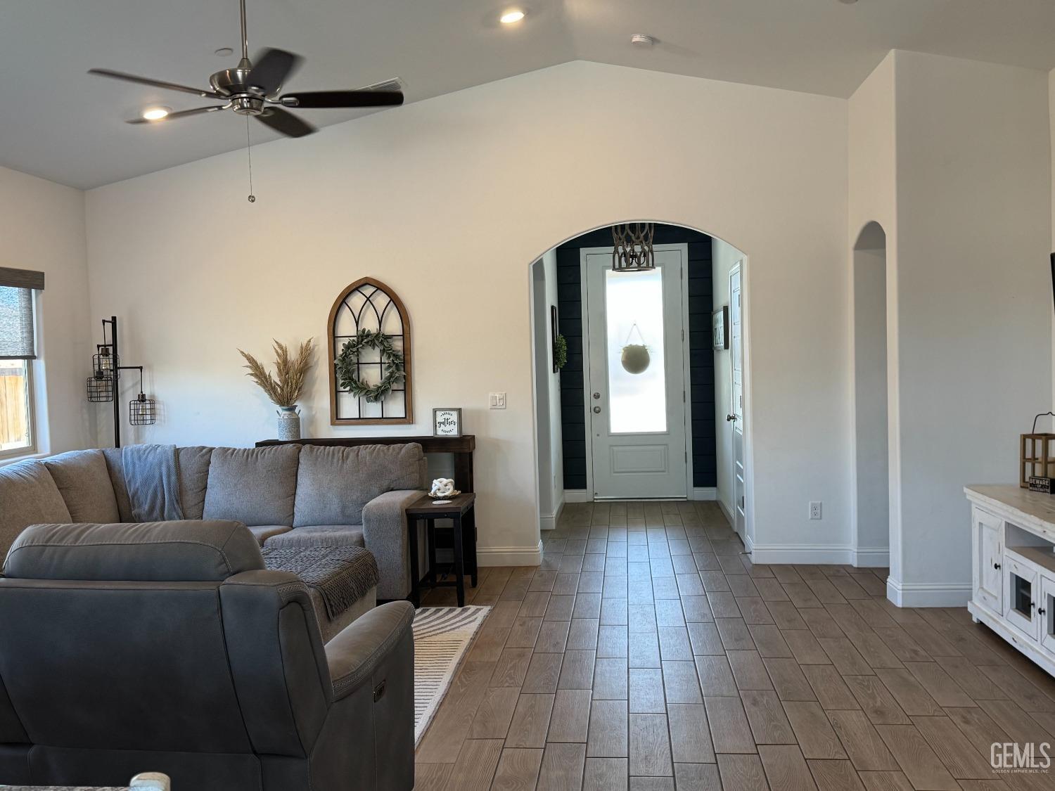 Undisclosed Address Shafter, CA 93263 - Photo 6 of 46 a living room with furniture and a fireplace