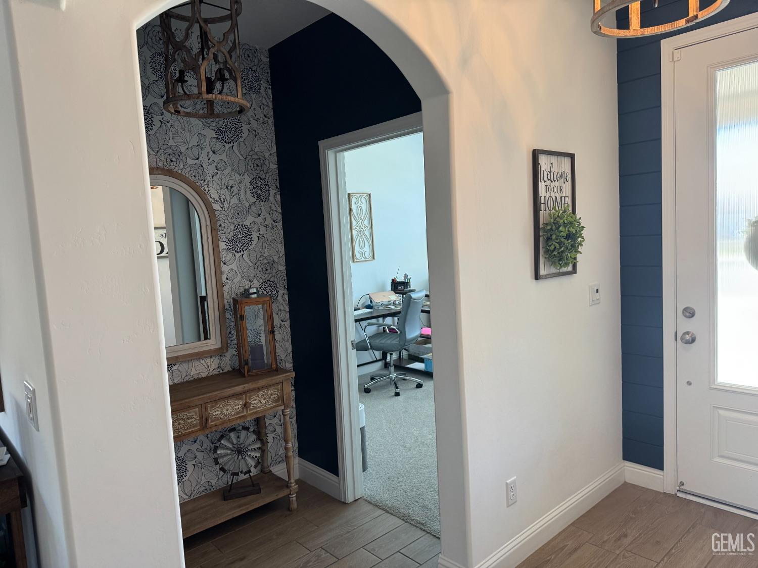 Undisclosed Address Shafter, CA 93263 - Photo 8 of 46 a view of a entryway door of the house