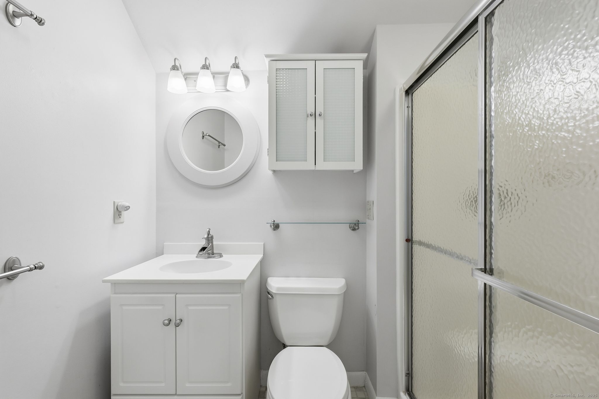 102 Lucas Park Road Norwich, CT 06360 - Photo 15 of 37 a bathroom with a toilet sink and mirror