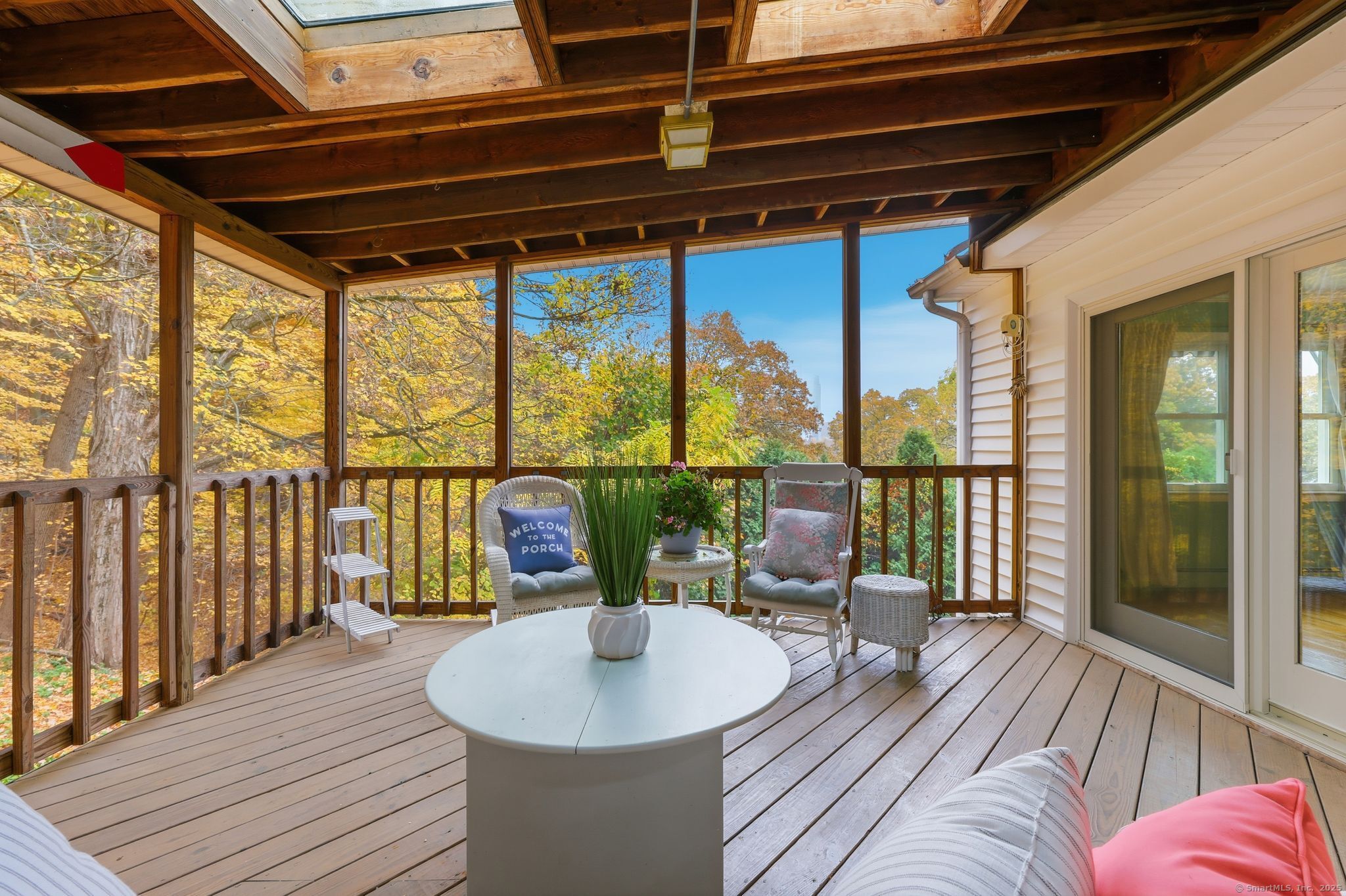 102 Lucas Park Road Norwich, CT 06360 - Photo 23 of 37 a balcony with furniture and wooden floor