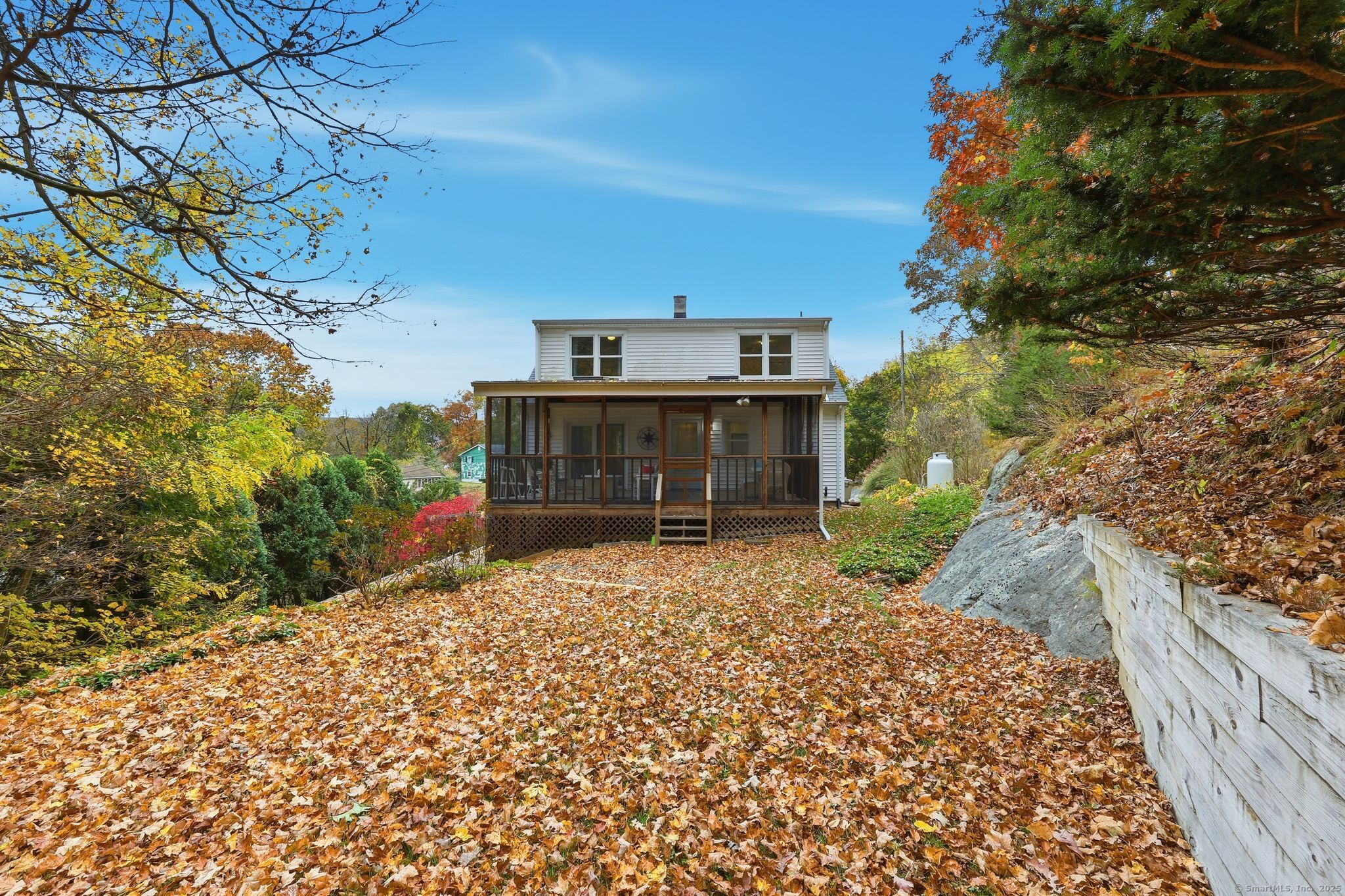 102 Lucas Park Road Norwich, CT 06360 - Photo 27 of 37 a front view of a house with a yard