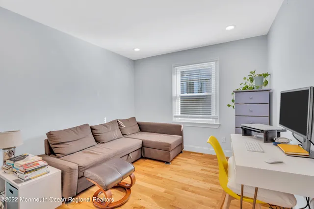 a workspace with furniture and window