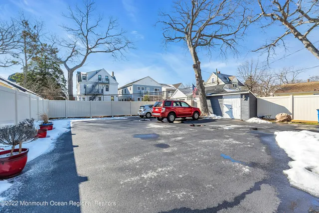 a car parked in front of a house
