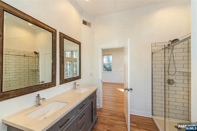 a kitchen with a refrigerator and a sink