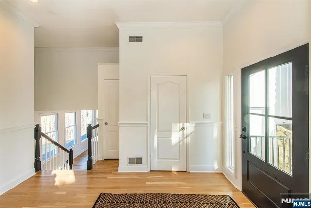 a view of a livingroom with wooden floor