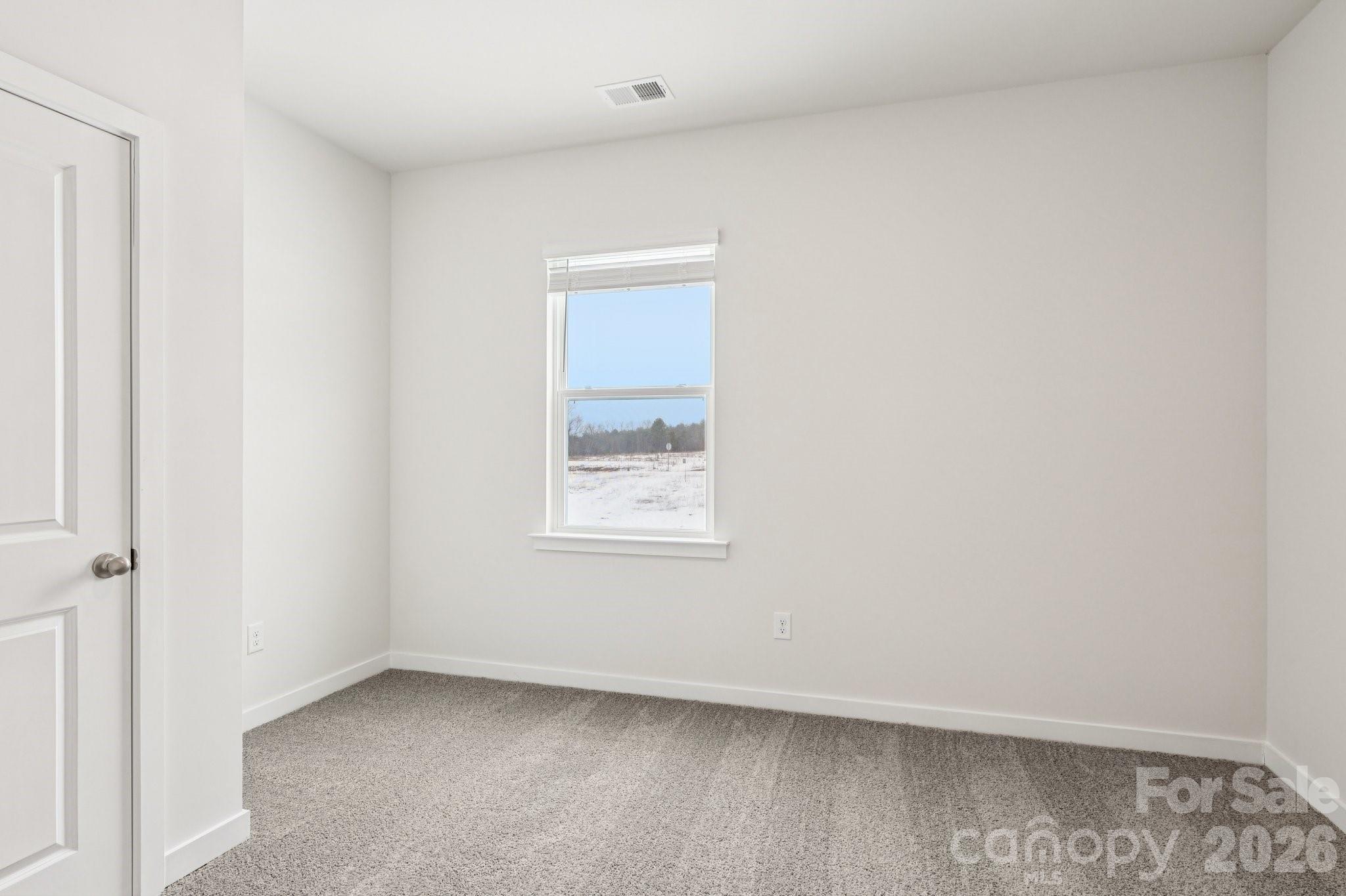 1447 Mammoth Road Hickory, NC 28602 - Photo 12 of 42 an empty room with a window