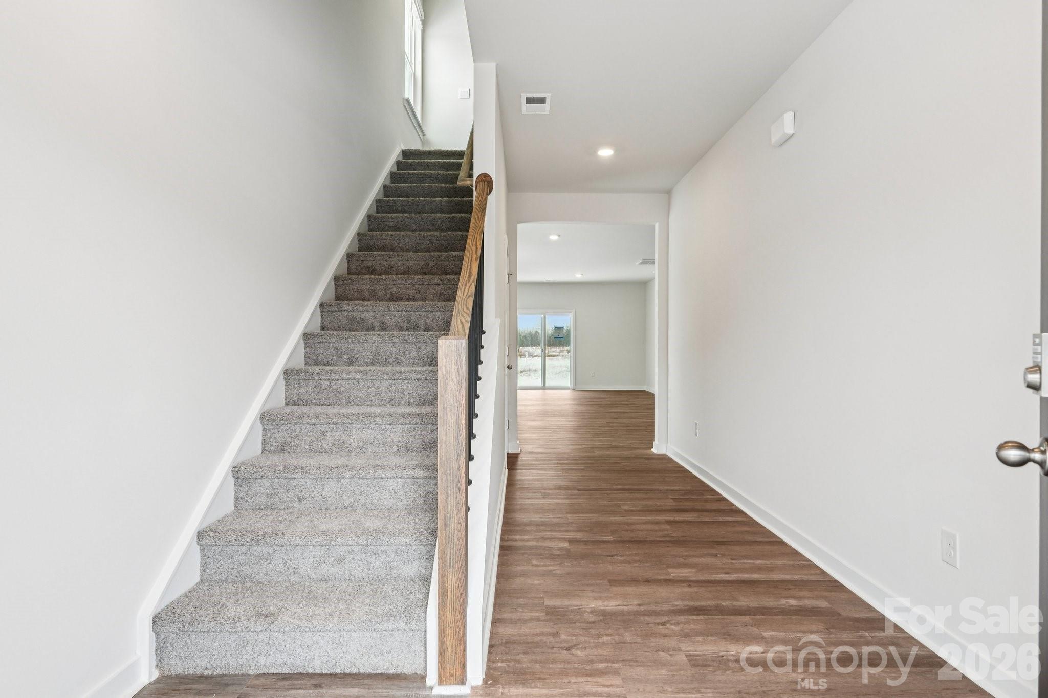 1447 Mammoth Road Hickory, NC 28602 - Photo 2 of 42 a view of a hallway with wooden floor and entryway