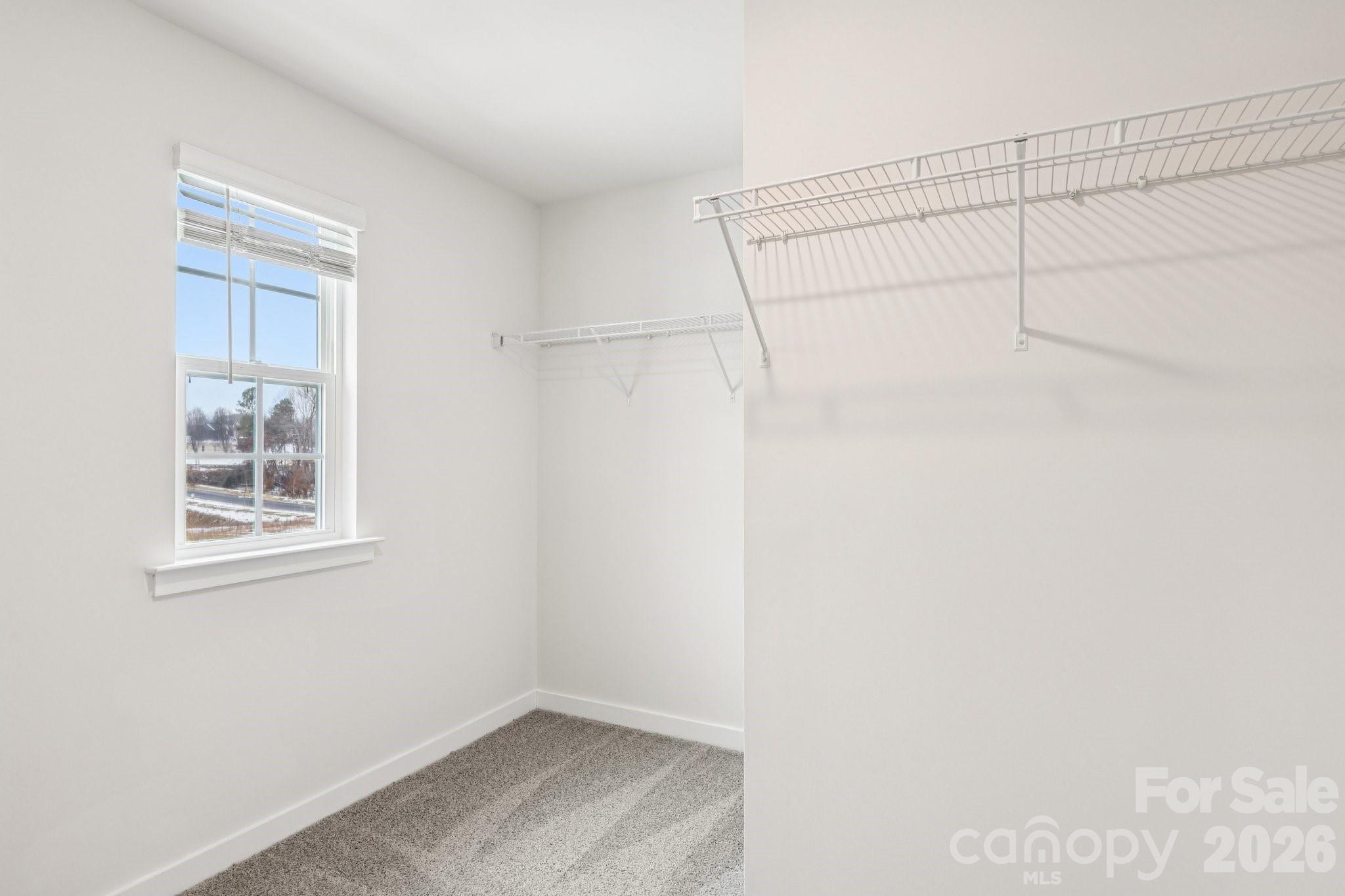 1447 Mammoth Road Hickory, NC 28602 - Photo 22 of 42 a view of a room with racks on the wall