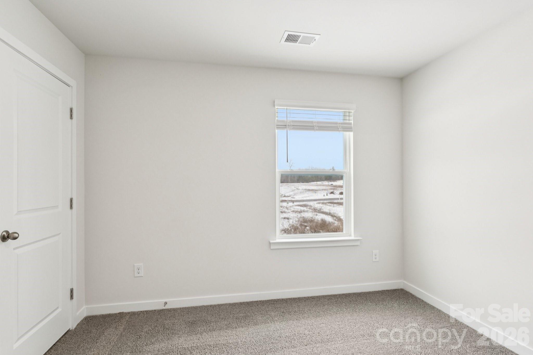 1447 Mammoth Road Hickory, NC 28602 - Photo 32 of 42 an empty room with a window