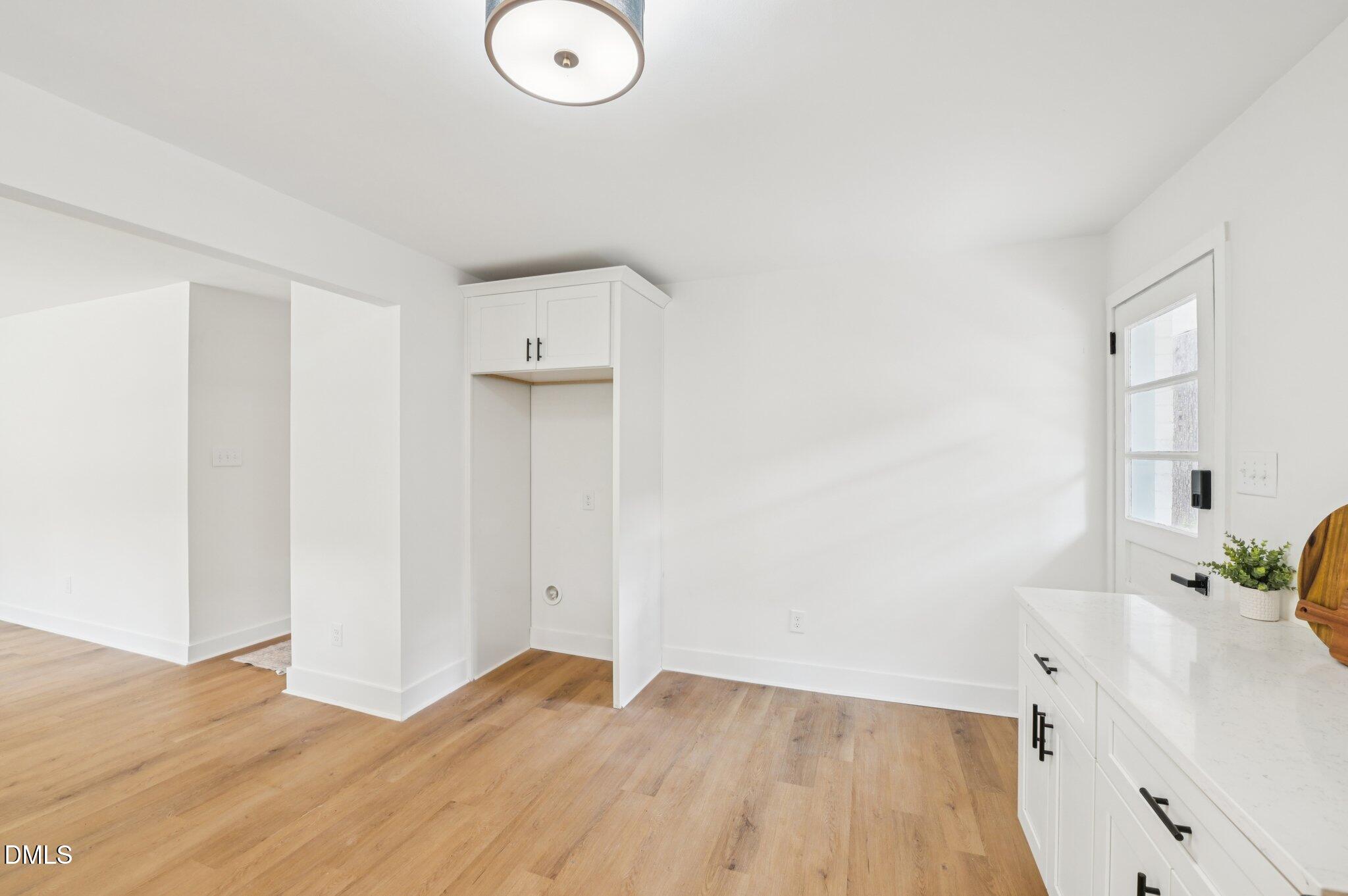 2708 Sarah Avenue Durham, NC 27707 - Photo 12 of 31 a view of livingroom with furniture and wooden floor
