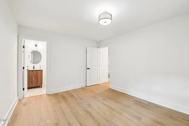 a view of a storage & utility room with wooden floor