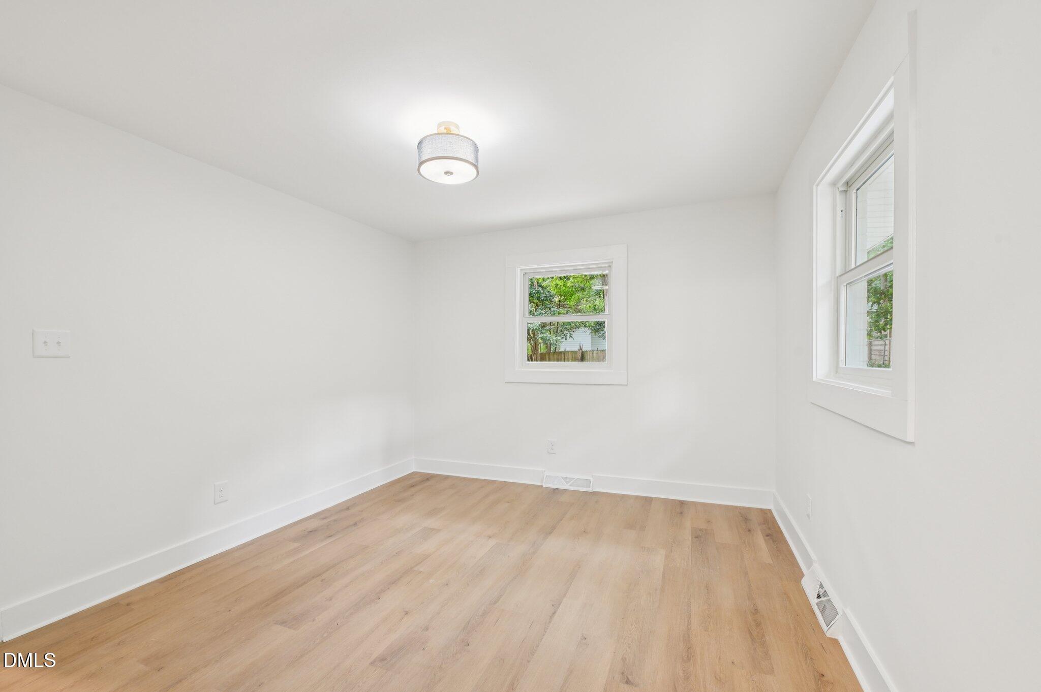 2708 Sarah Avenue Durham, NC 27707 - Photo 15 of 31 an empty room with a window