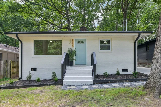 a front view of house with yard