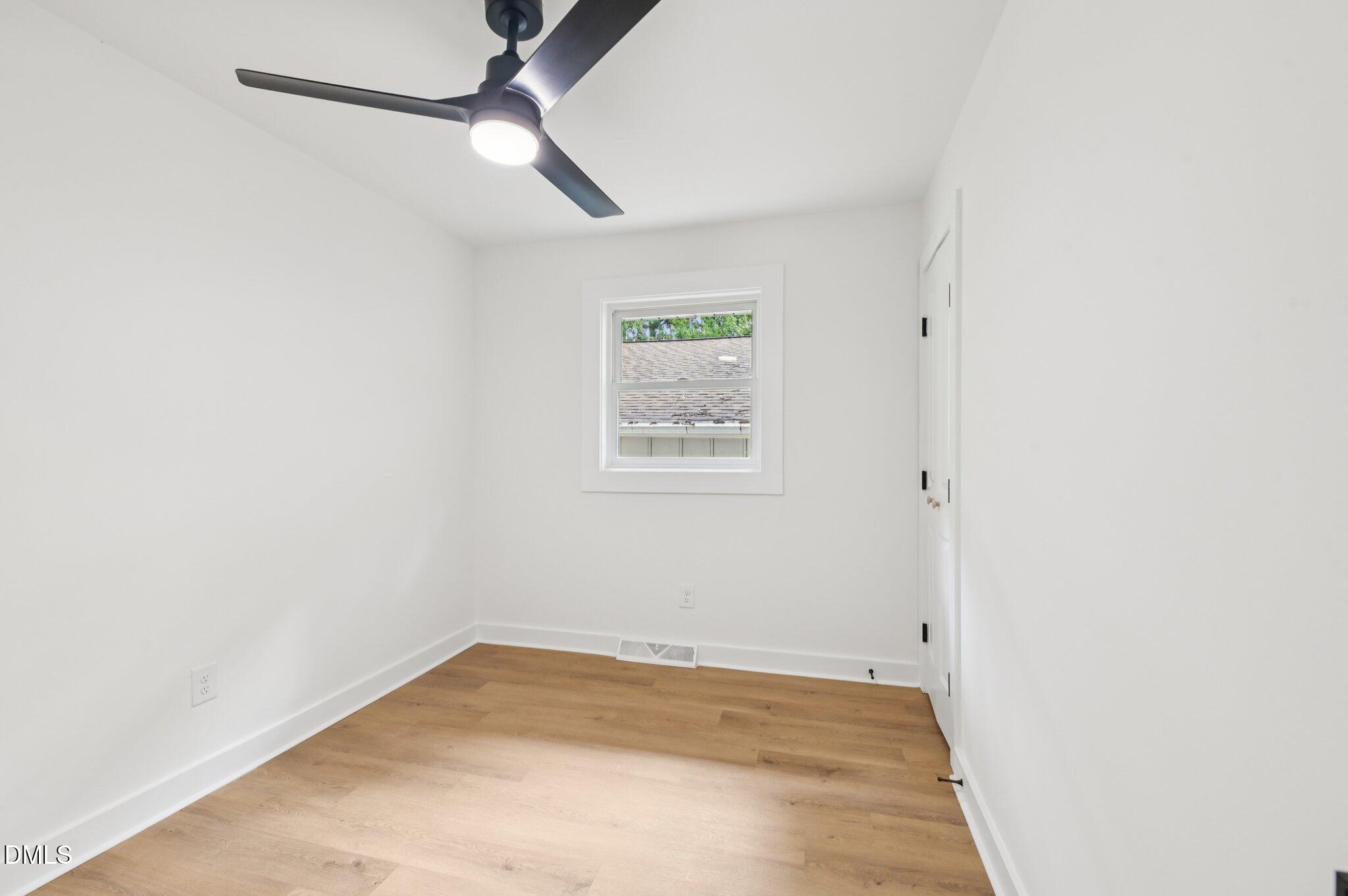 2708 Sarah Avenue Durham, NC 27707 - Photo 21 of 31 a view of room with window and ceiling fan