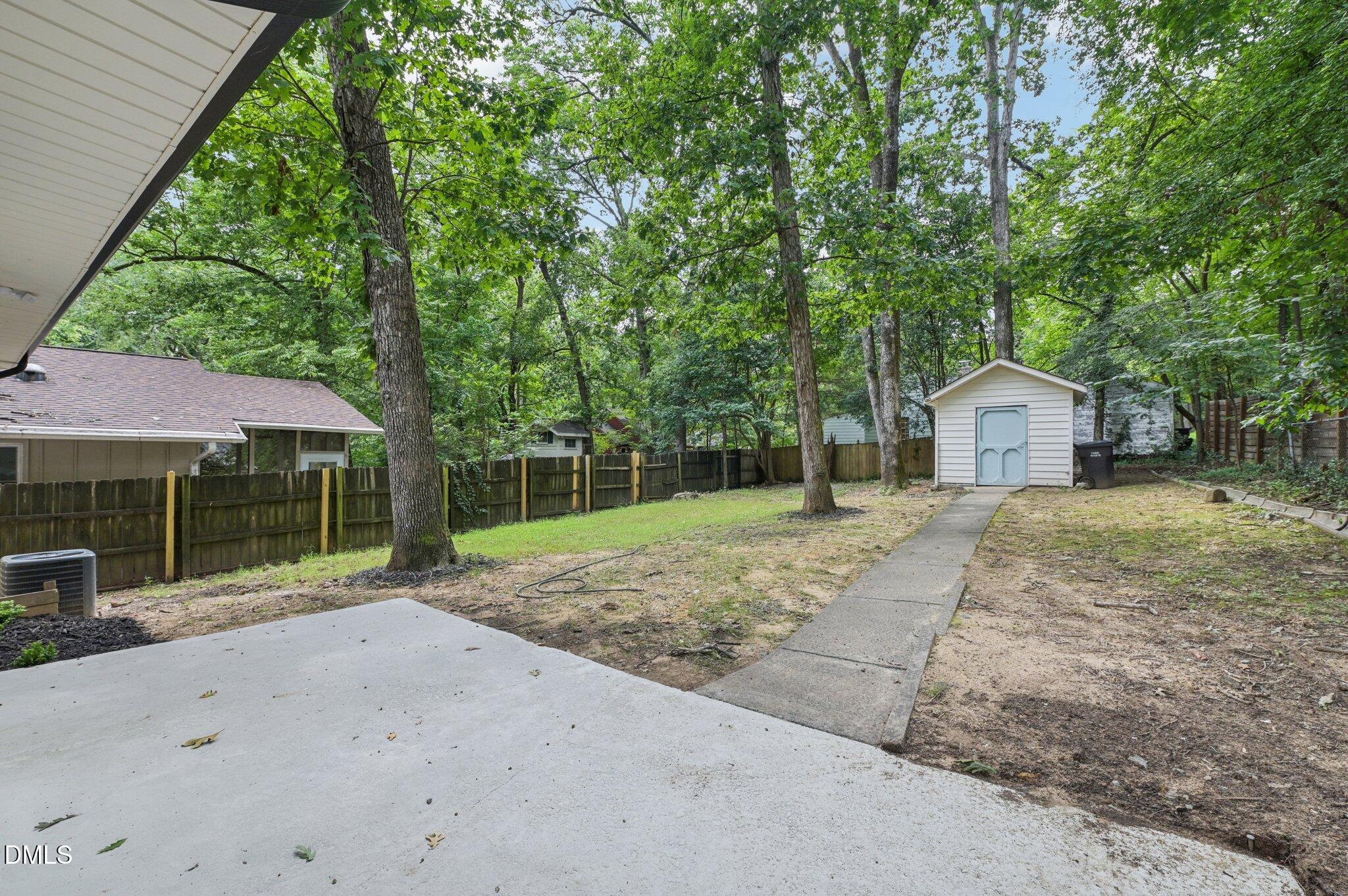 2708 Sarah Avenue Durham, NC 27707 - Photo 27 of 31 a house with a tree in front of it