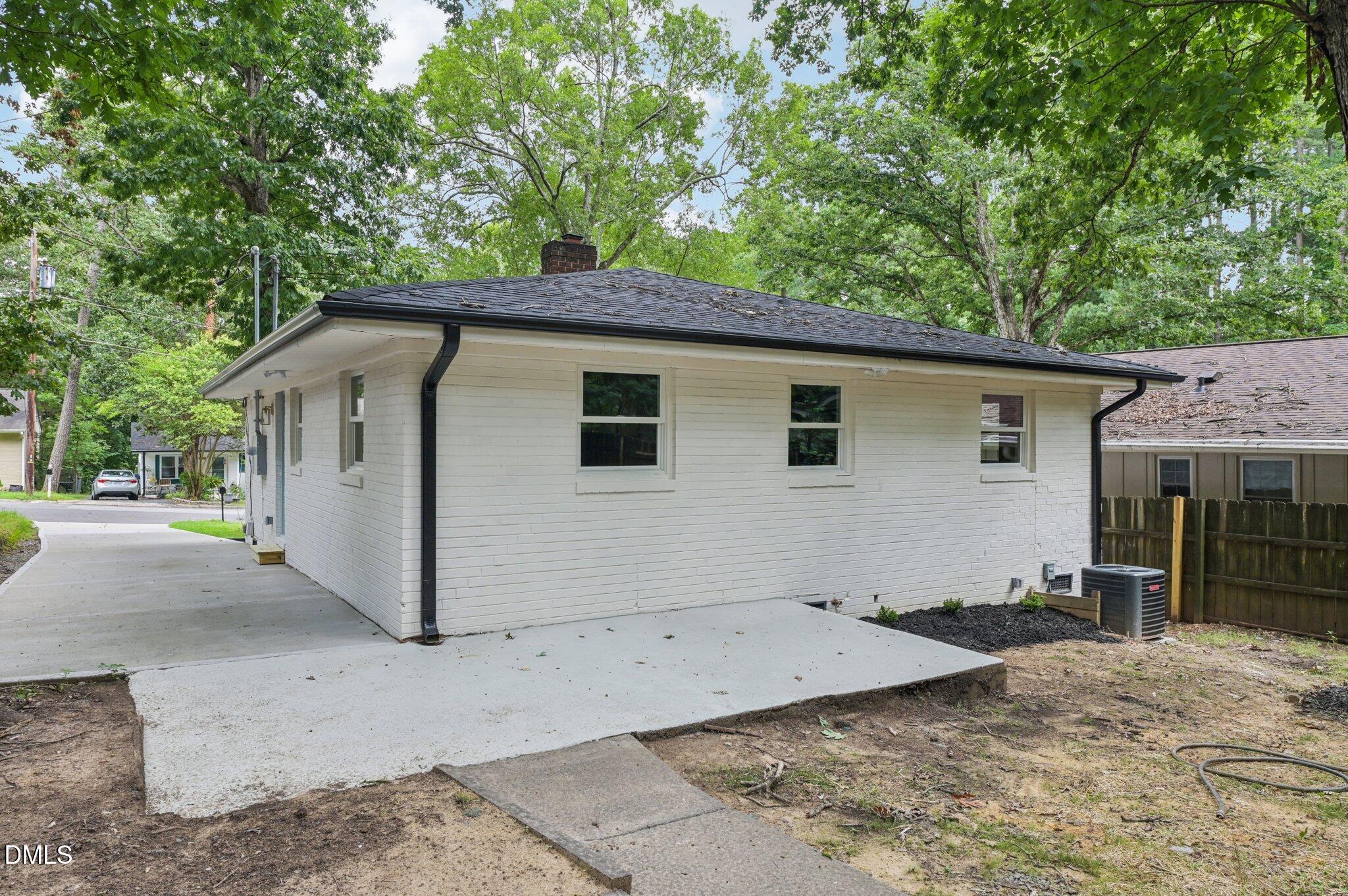 2708 Sarah Avenue Durham, NC 27707 - Photo 28 of 31 a view of a house with a backyard