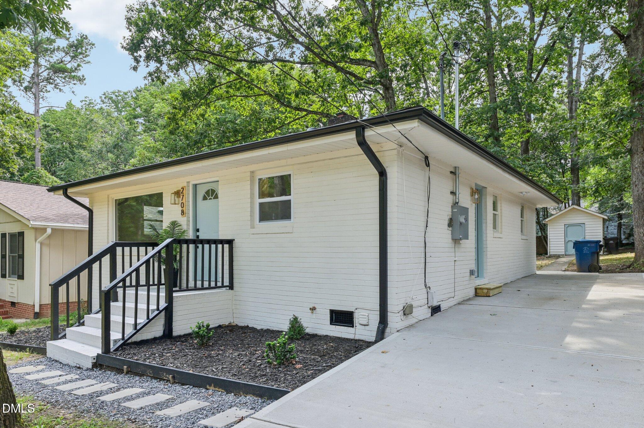 2708 Sarah Avenue Durham, NC 27707 - Photo 4 of 31 a porch with seating space
