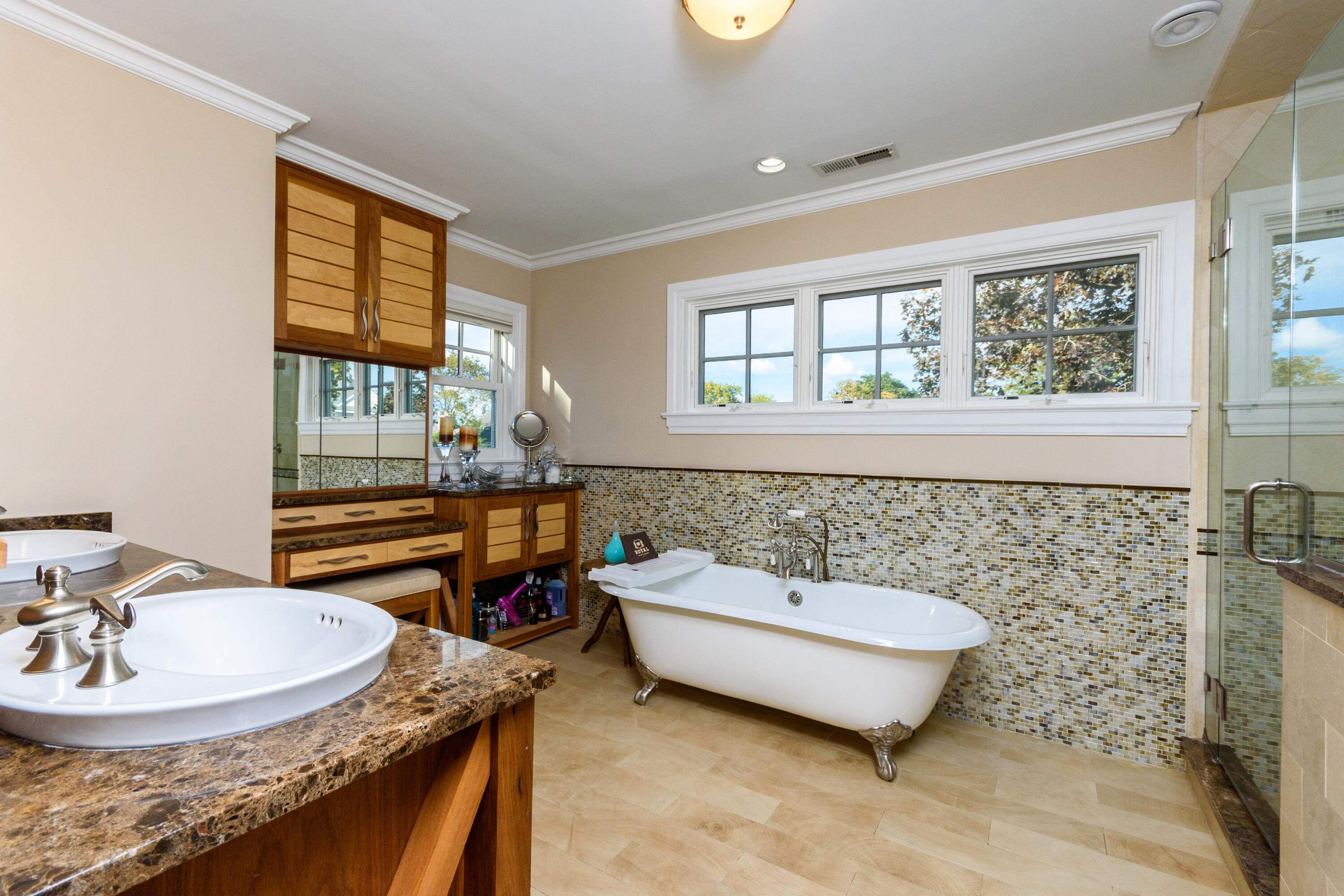 10 Mayflower Road Darien, CT 06820 - Photo 17 of 38 a bathroom with a granite countertop sink and a mirror