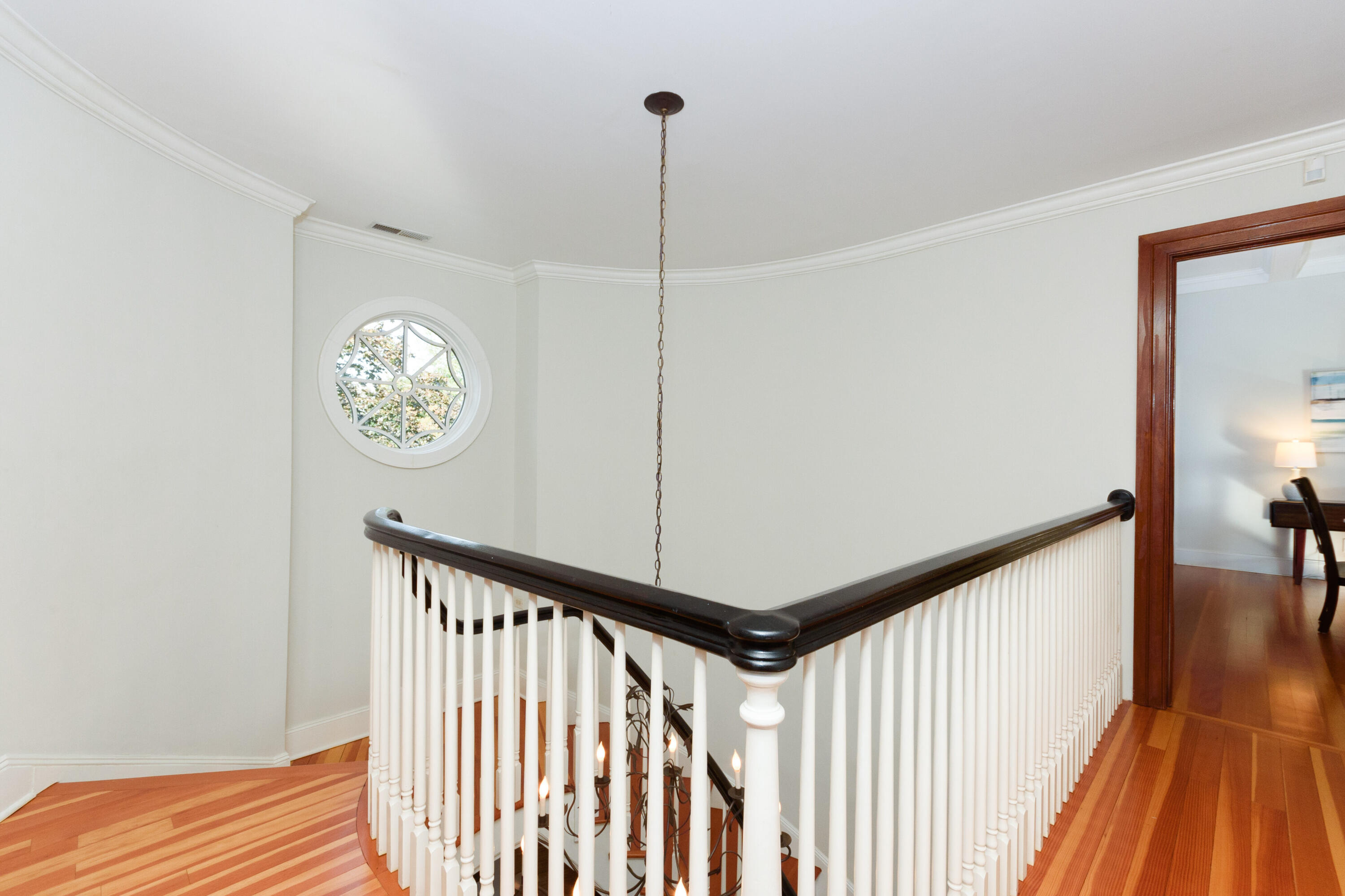 10 Mayflower Road Darien, CT 06820 - Photo 24 of 38 a view of a hallway with wooden floor and stairs