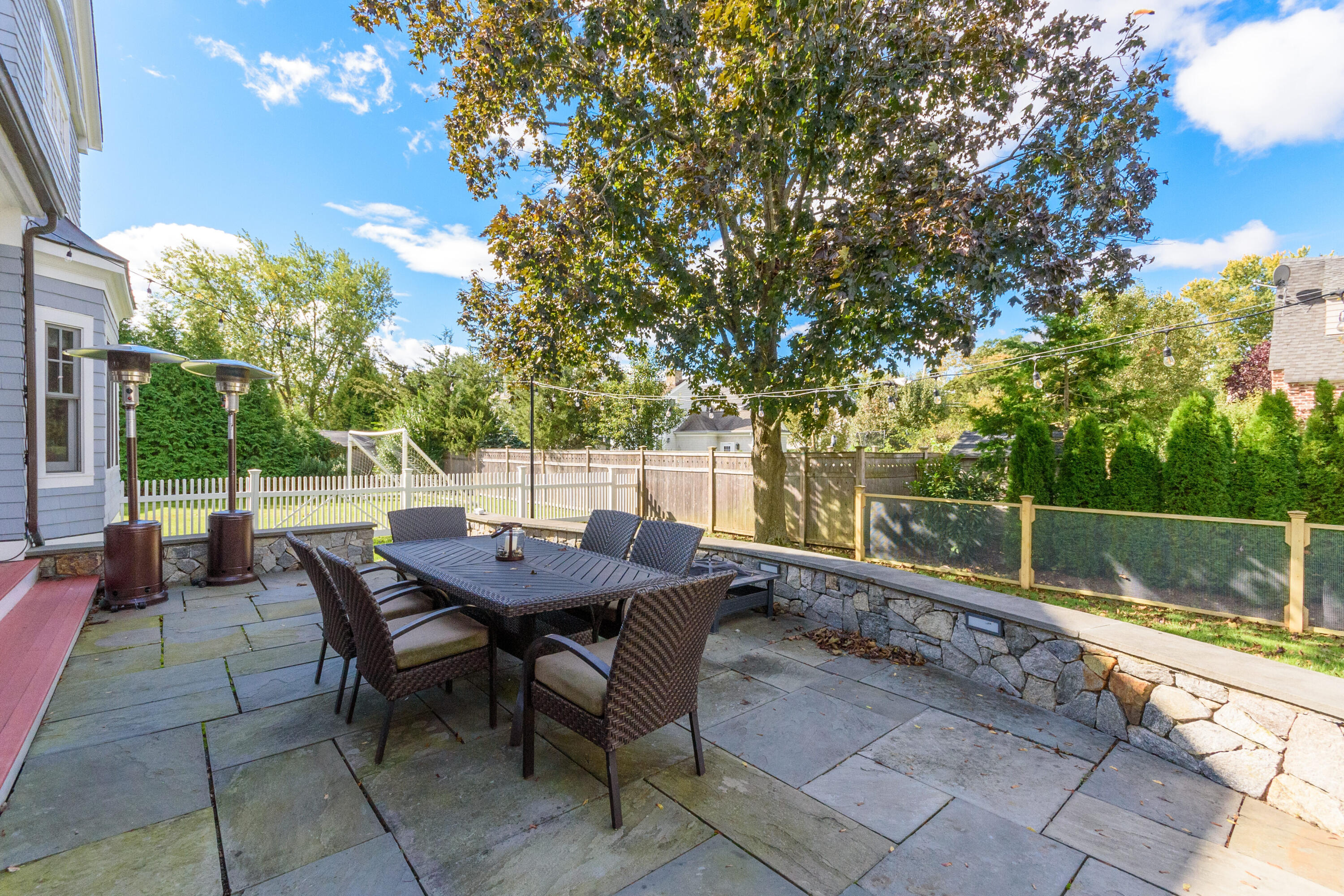 10 Mayflower Road Darien, CT 06820 - Photo 25 of 38 a view of a backyard with furniture and tub
