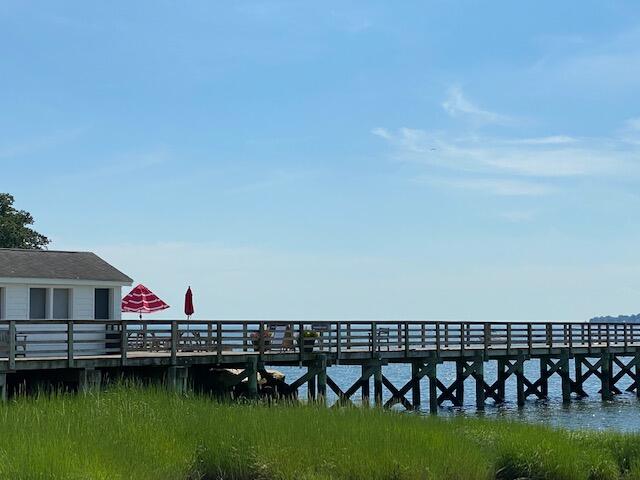 10 Mayflower Road Darien, CT 06820 - Photo 31 of 38 a view of a lake with houses in the back