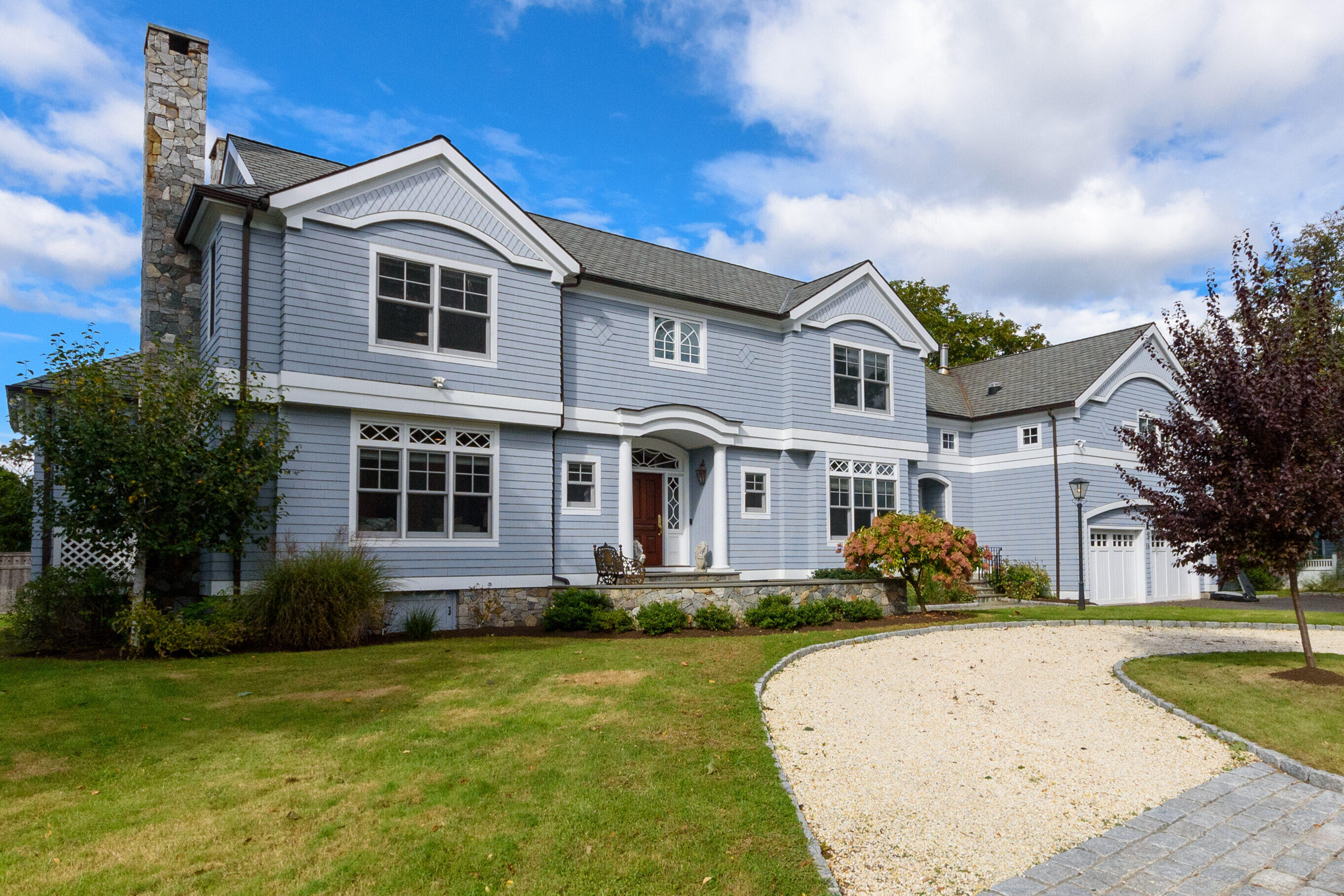 10 Mayflower Road Darien, CT 06820 - Photo 4 of 38 a front view of a house with a yard