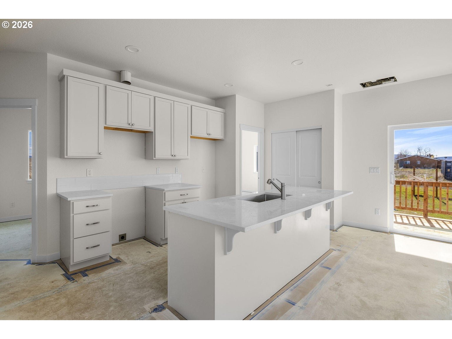 518 Southwest 6th Street Madras, OR 97741 - Photo 8 of 19 a kitchen that has a sink and a stove in it