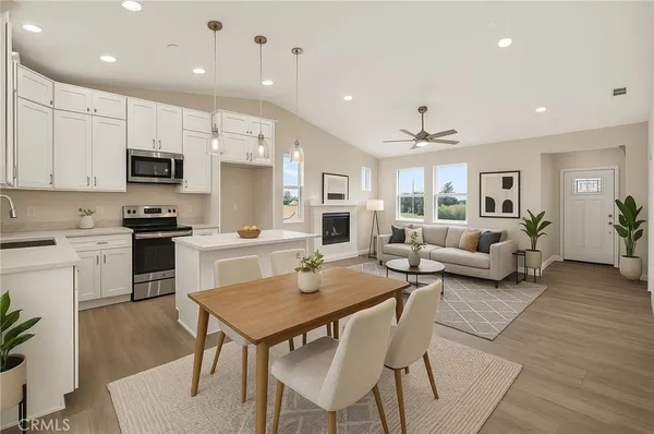 a kitchen with a table and chairs in it