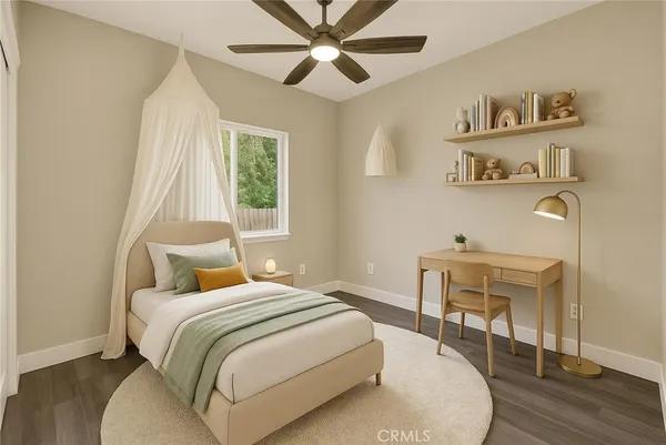 a bedroom with a bed and a table in it