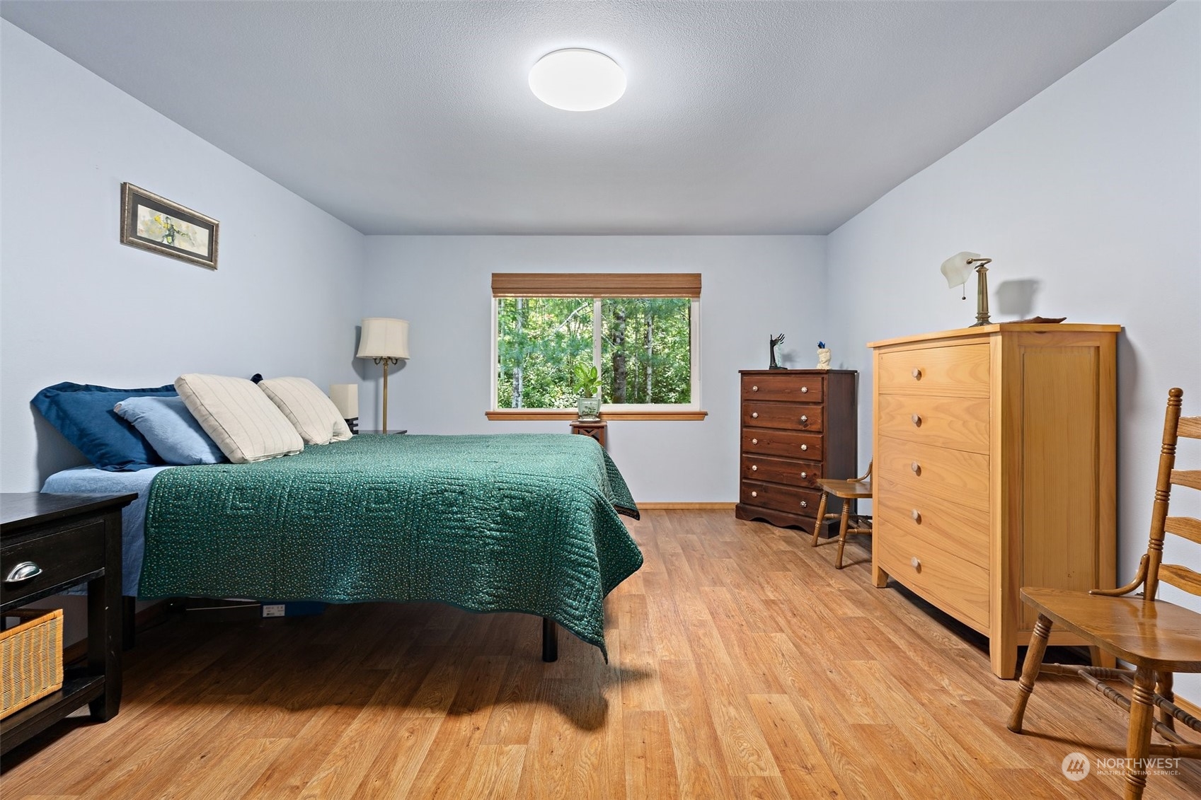 1500 Northeast Bear Ridge Road Belfair, WA 98528 - Photo 14 of 40 a bedroom with furniture and a window