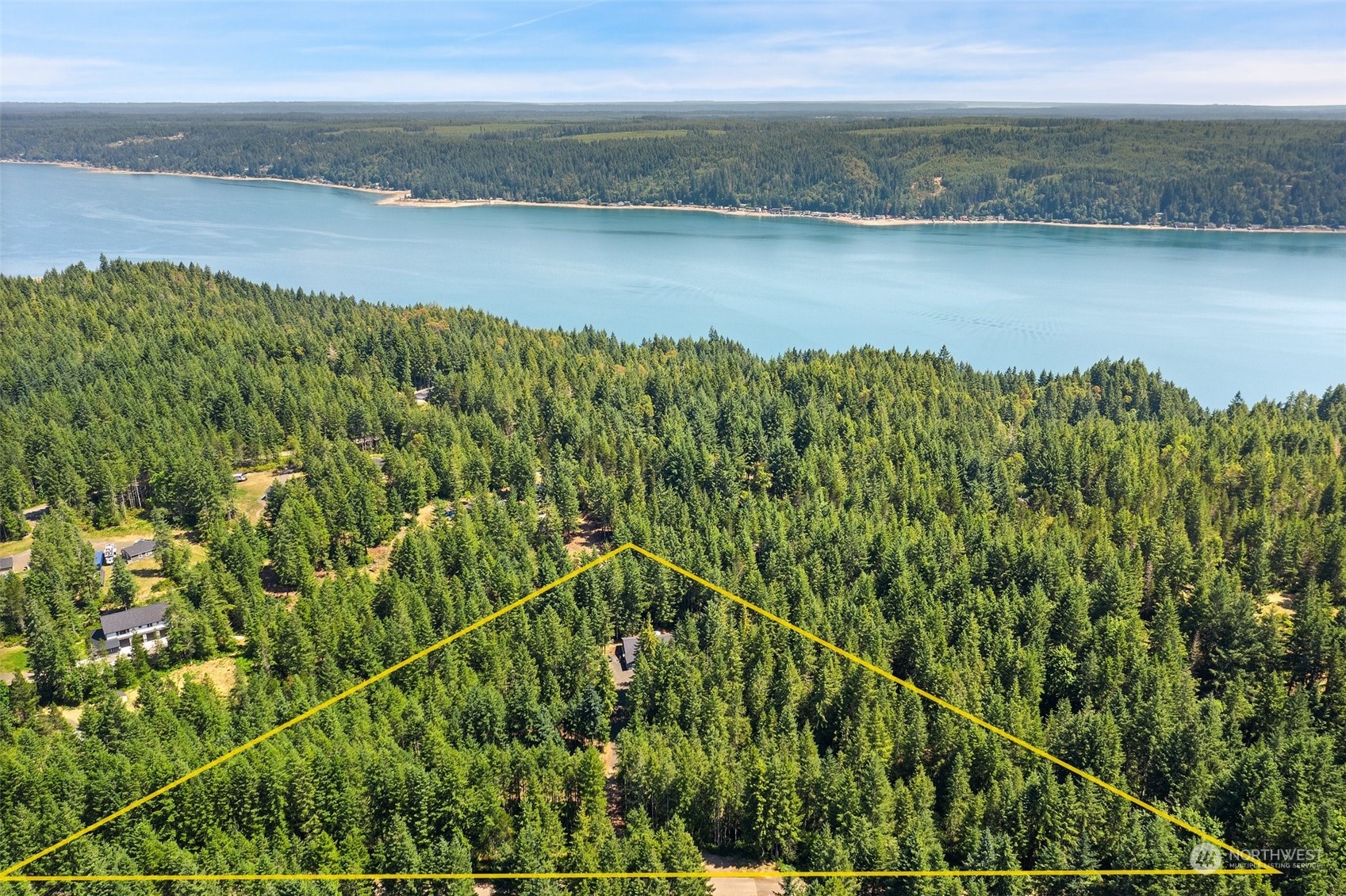 1500 Northeast Bear Ridge Road Belfair, WA 98528 - Photo 38 of 40 a view of a lake with a yard