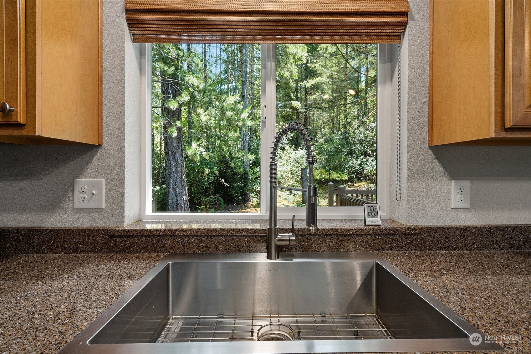 1500 Northeast Bear Ridge Road Belfair, WA 98528 - Photo 8 of 40 a kitchen with granite countertop a sink and a window