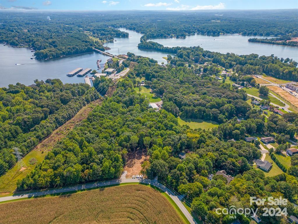 4516 Slanting Bridge Road Sherrills Ford, NC 28673 - Photo 14 of 18 an aerial view of a houses with a yard and lake view