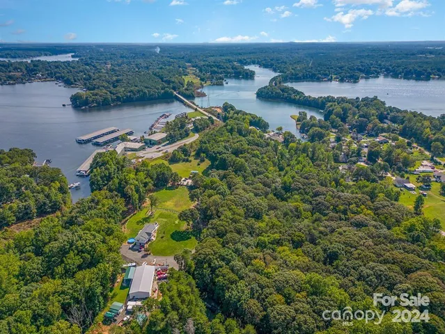 an aerial view of lake residential house with outdoor space